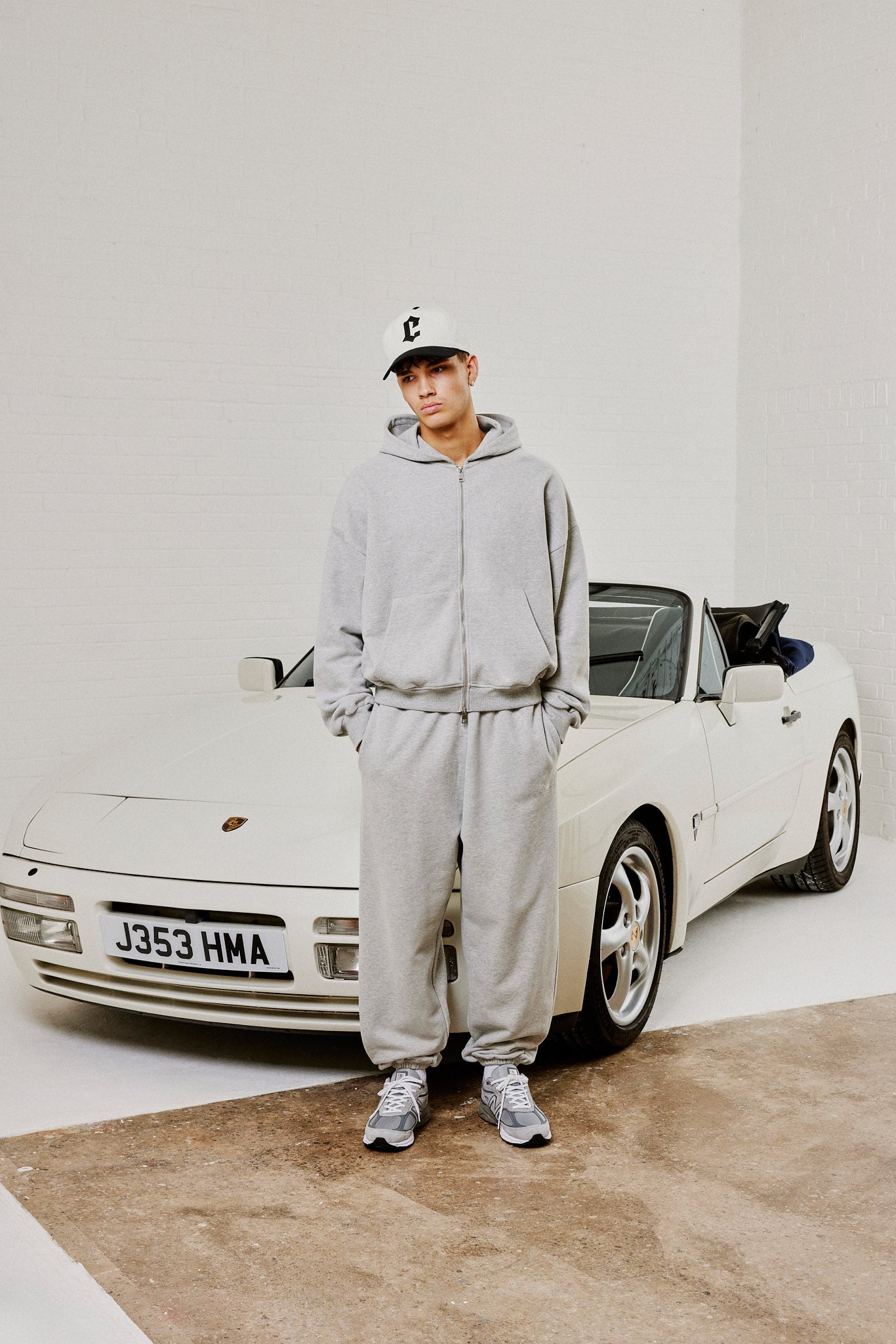 Kapuzenjacke mit Reißverschluss und Jogginghose mit Bündchen – Graumeliert