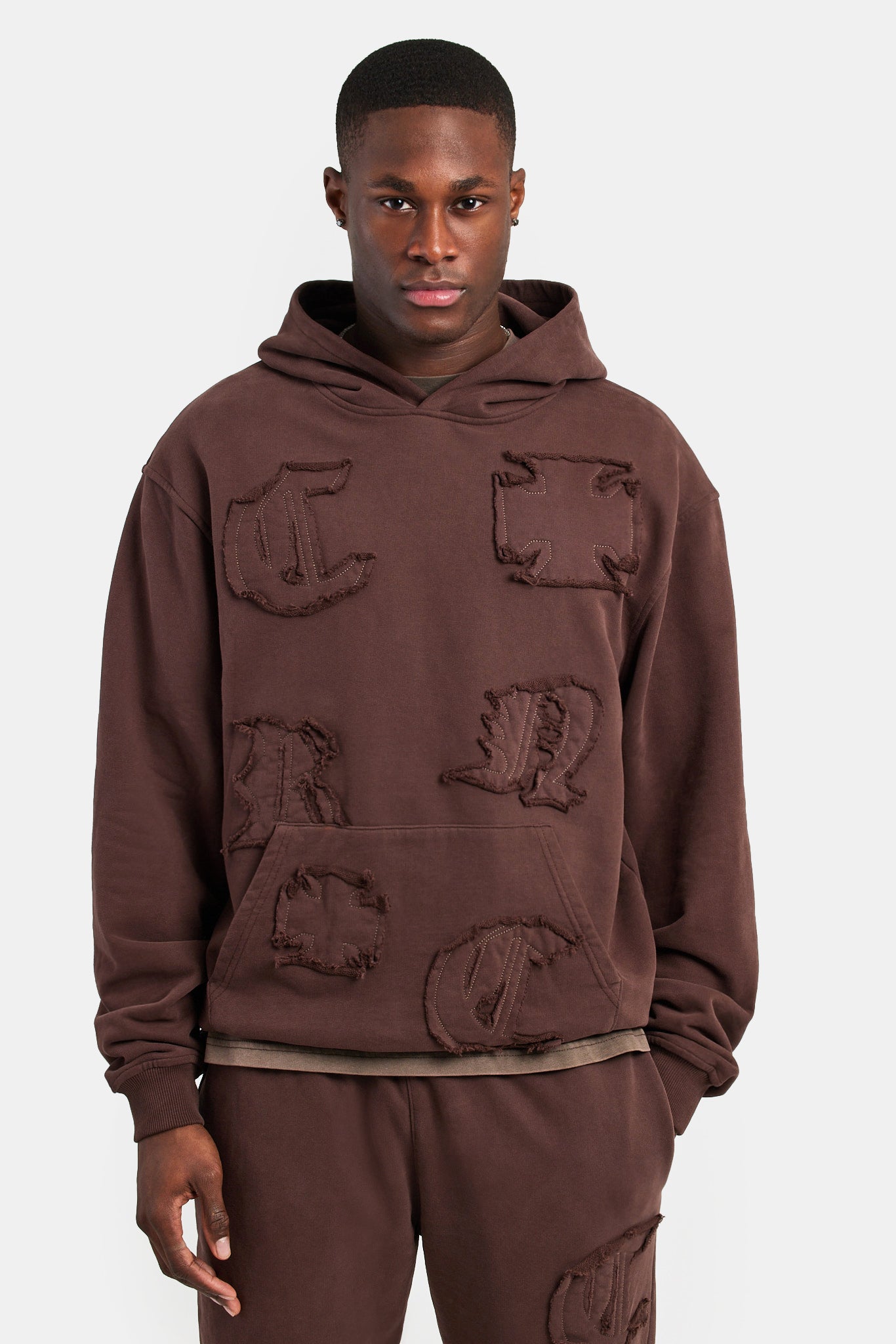 Kapuzenpullover mit Raw Edge-Applikation - Braun