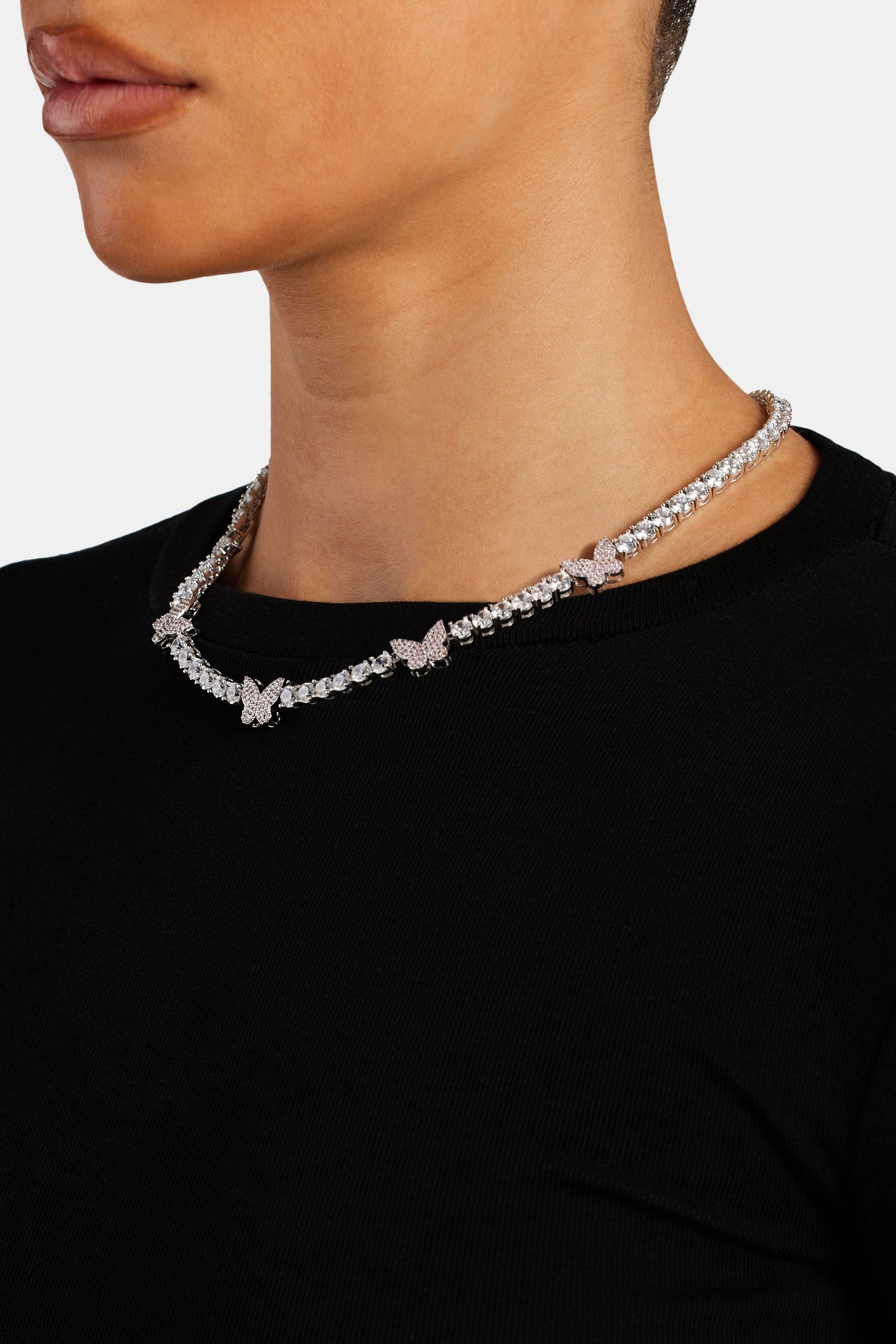 5 mm Tenniskette mit Schmetterlings-Anhänger und eisrosa Zirkonia