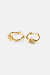 Polierte Wickel-Creolen mit Eisverzierung – 18 mm