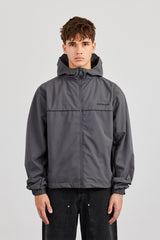 Trainingsjacke aus Nylon mit Paspelierung - Anthrazit