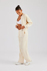 Bomberjacke und Jogginghose aus Strick mit Reißverschluss vorne - Haferflocken