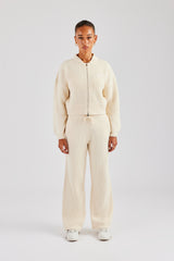 Bomberjacke und Jogginghose aus Strick mit Reißverschluss vorne - Haferflocken