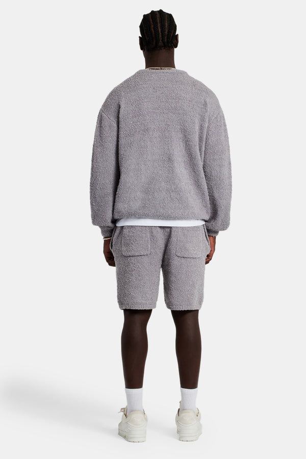 Male model wearing theTextured Knitted Sweatshirt Short Tracksuit in grey