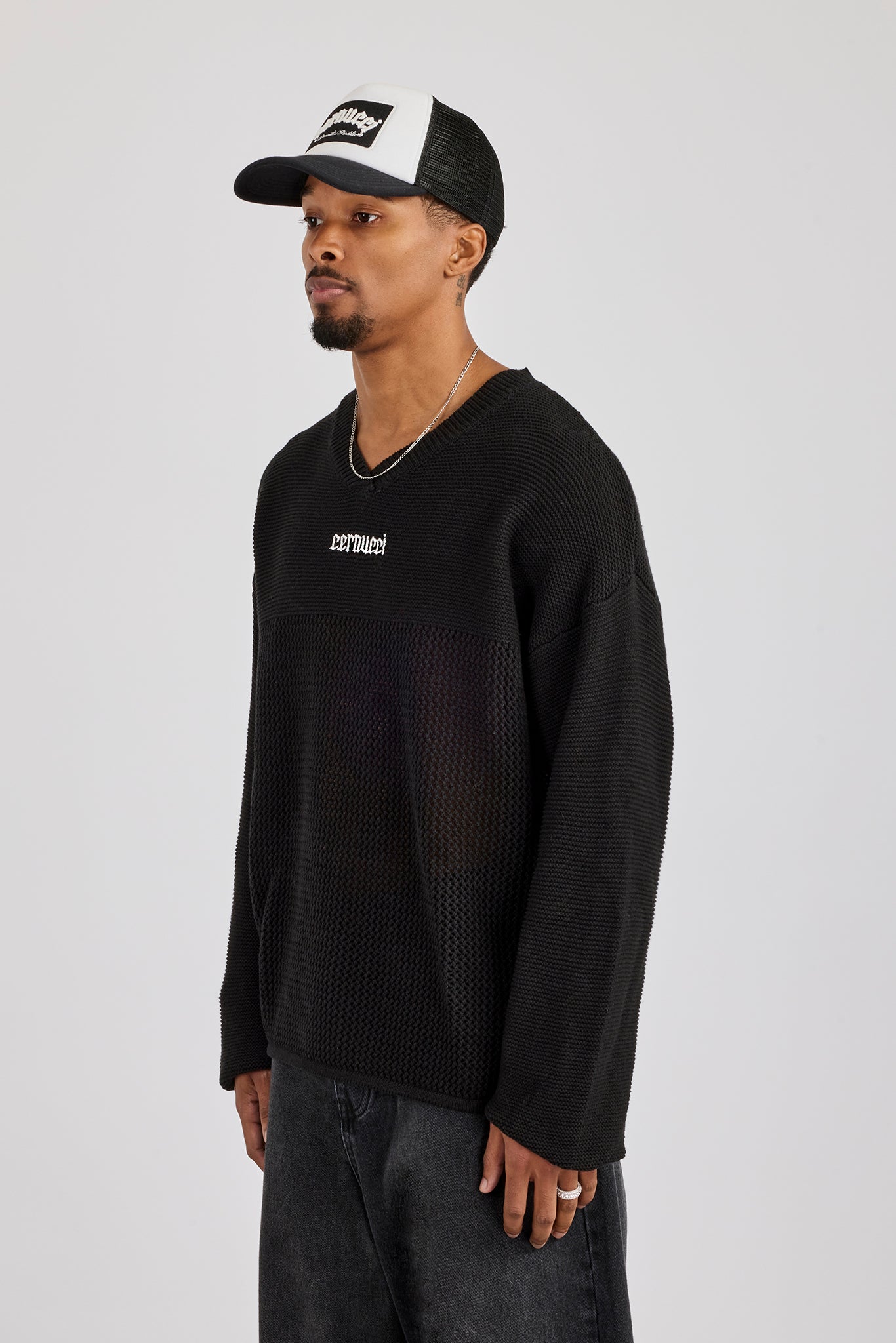 Langärmliges Strick-College-Shirt – Schwarz