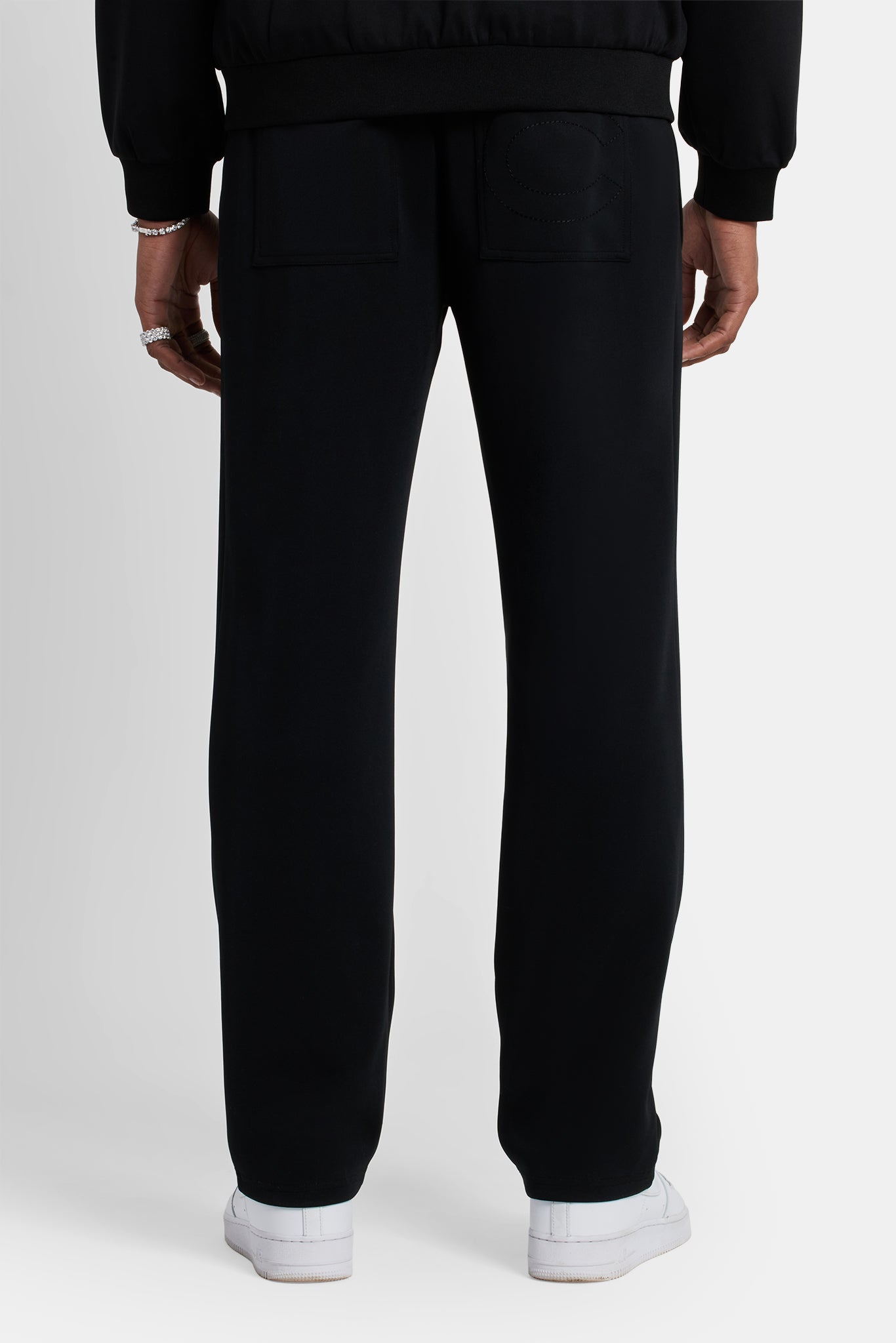 Trainingsanzug mit Strass-Wappen - Schwarz 