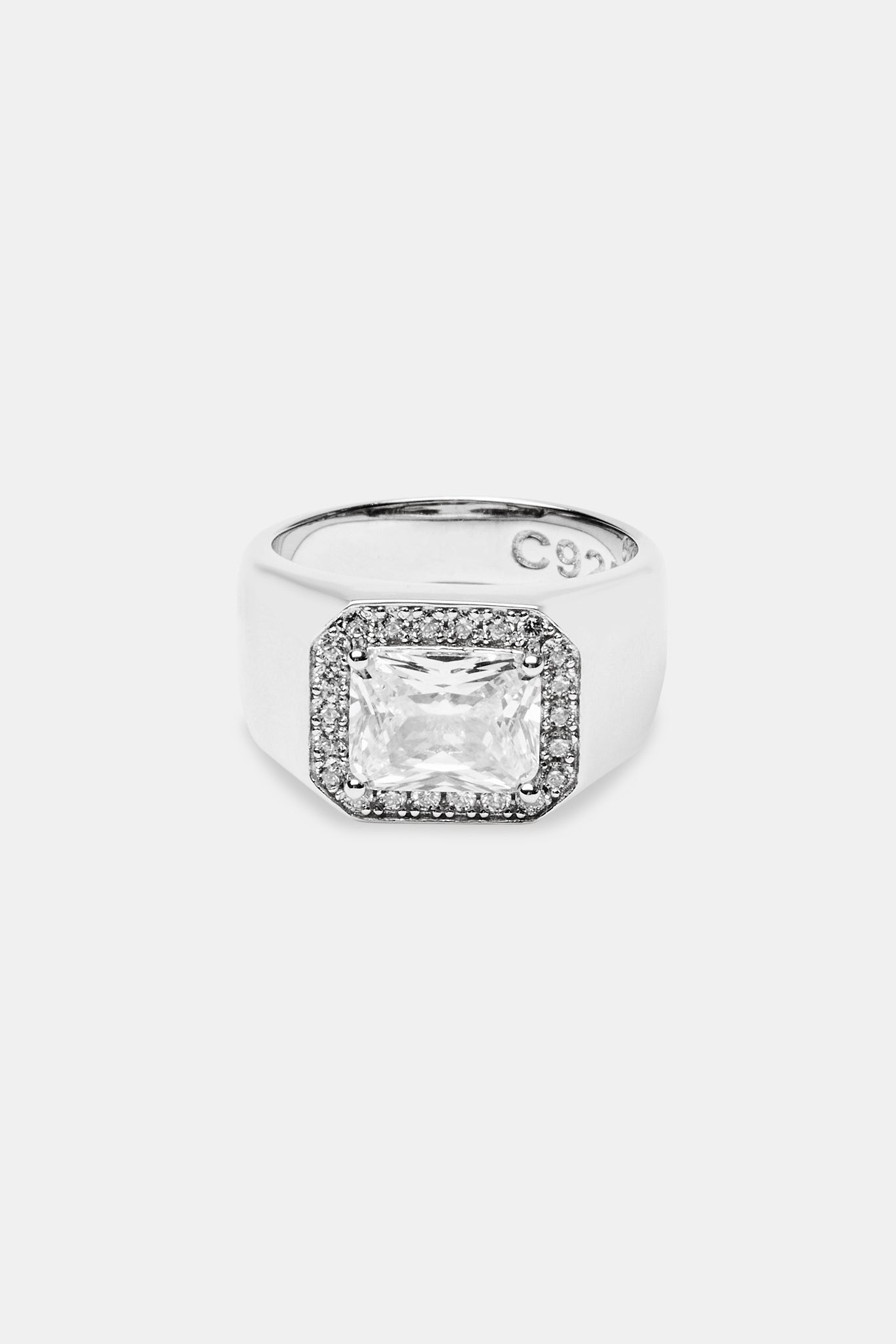 polishes ring with iced stone detail with white background 
