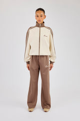 Trainingsjacke und Hose mit Kontrastdetails