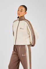 Contrast Detail Track Top – Cremeweiß