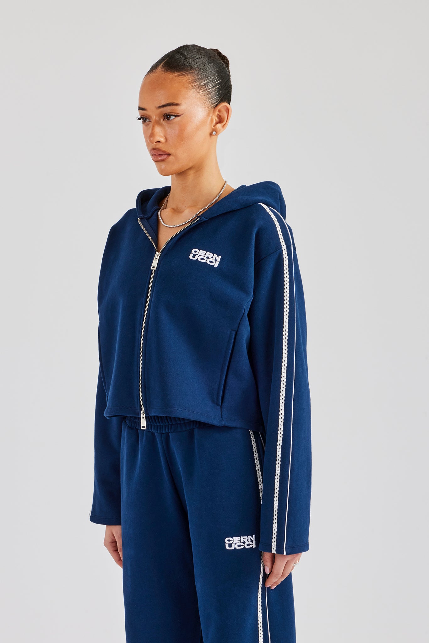 Kastenförmiger Reißverschluss mit Spitzenkante - Marineblau