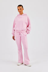 Kurzer Raglan-Hoodie und Schlaghose – verwaschenes Rosa