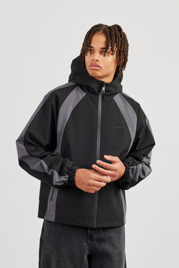 Trainingsjacke aus Nylon mit Einsätzen - Schwarz