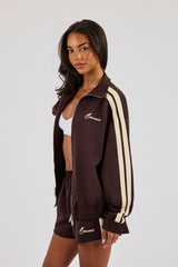 Buttergelbe Trainingsjacke mit Trichterhalsausschnitt und durchgehendem Reißverschluss - Schokolade