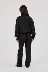 Jacke mit Trichterhalsausschnitt und Jogginghose mit weitem Bein - Schwarz