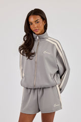 Trainingsjacke mit durchgehendem Reißverschluss und Trichterhalsband - Grau