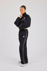 Kurze Trainingsjacke und Jogginghose aus knitterfreiem Nylon mit Paspelierung und weitem Bein – Schwarz