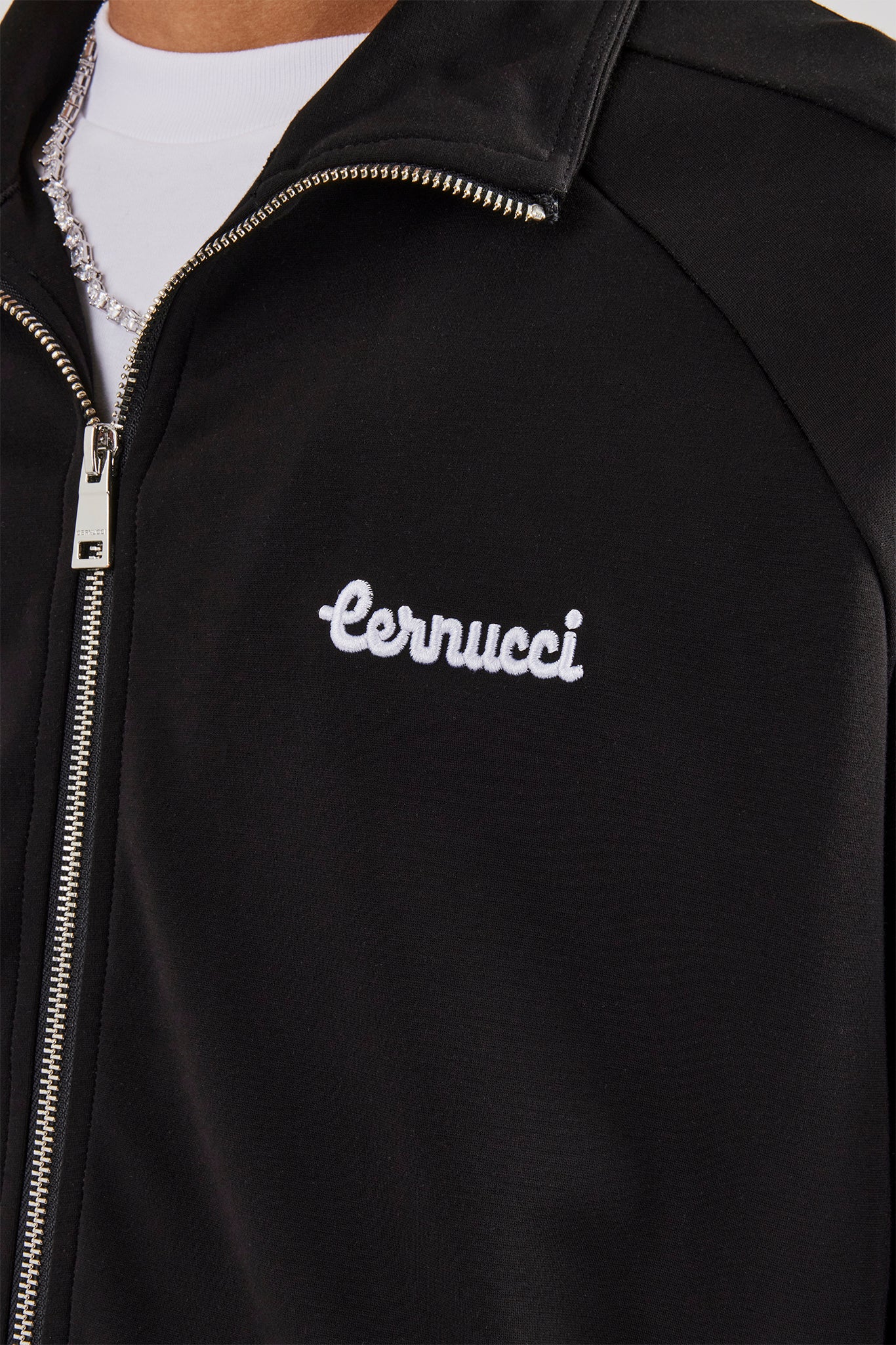 Trainingsjacke mit Raglan-Stickerei - Schwarz