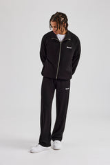 Trainingsjacke mit Raglan-Stickerei - Schwarz