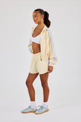 Taping Cropped Funnel Neck Jacket & Taping Short - Butter Yellow
