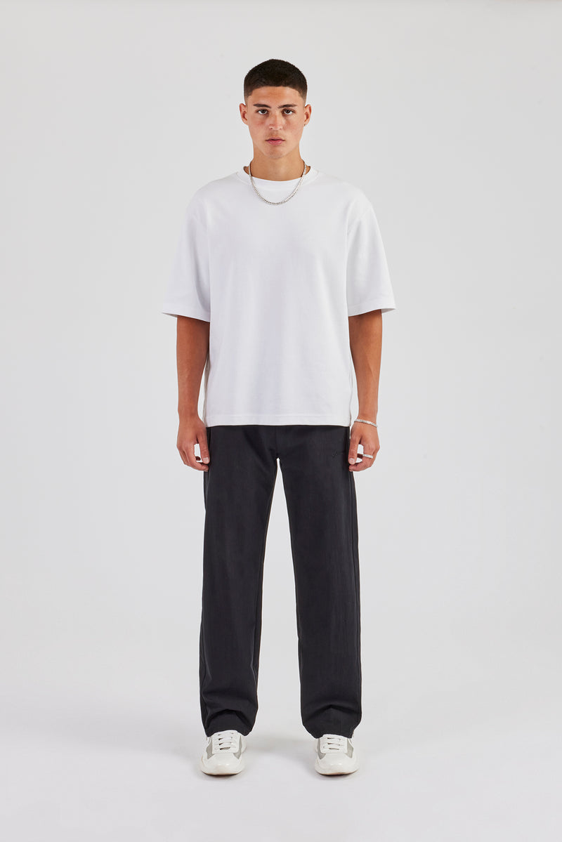 Trainingshose aus gebondetem Nylon - Schwarz