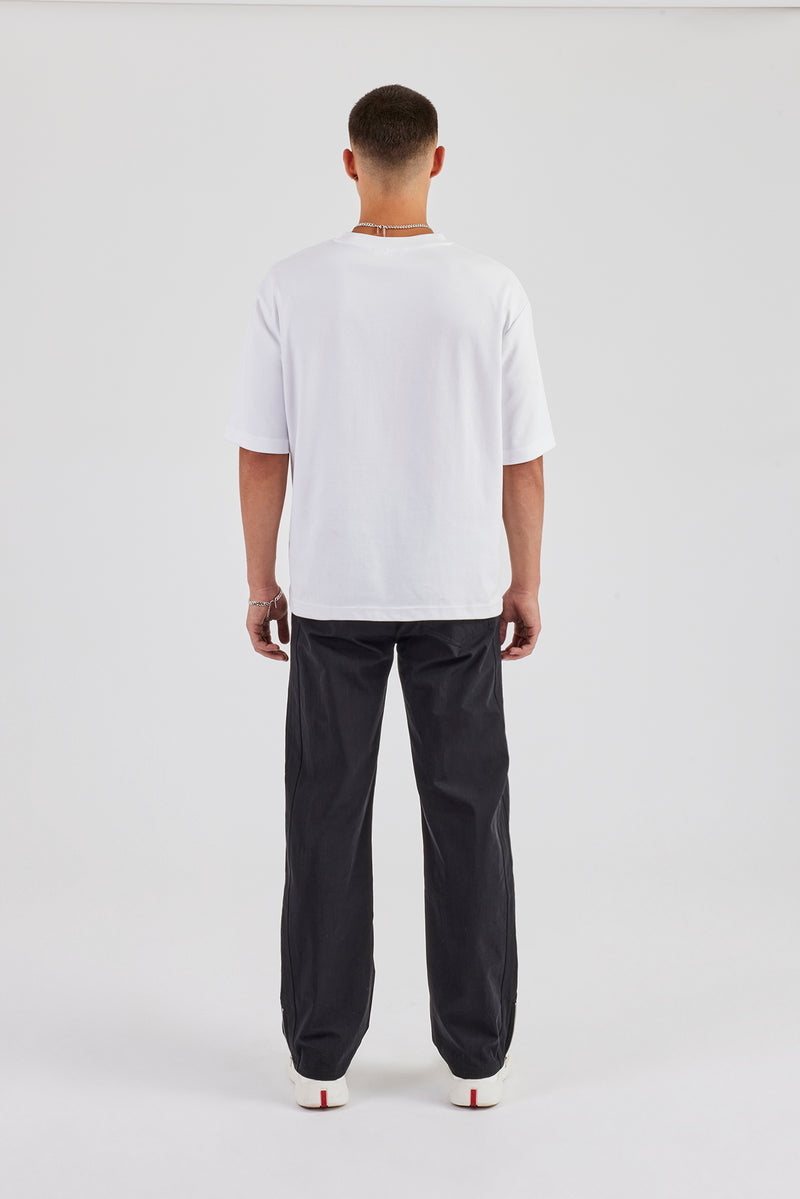 Trainingshose aus gebondetem Nylon - Schwarz