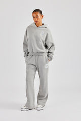 Boxy-Hoodie mit C-Stickerei – Grau meliert