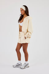 Kapuzenpullover und Shorts mit Reißverschluss – Buttergelb