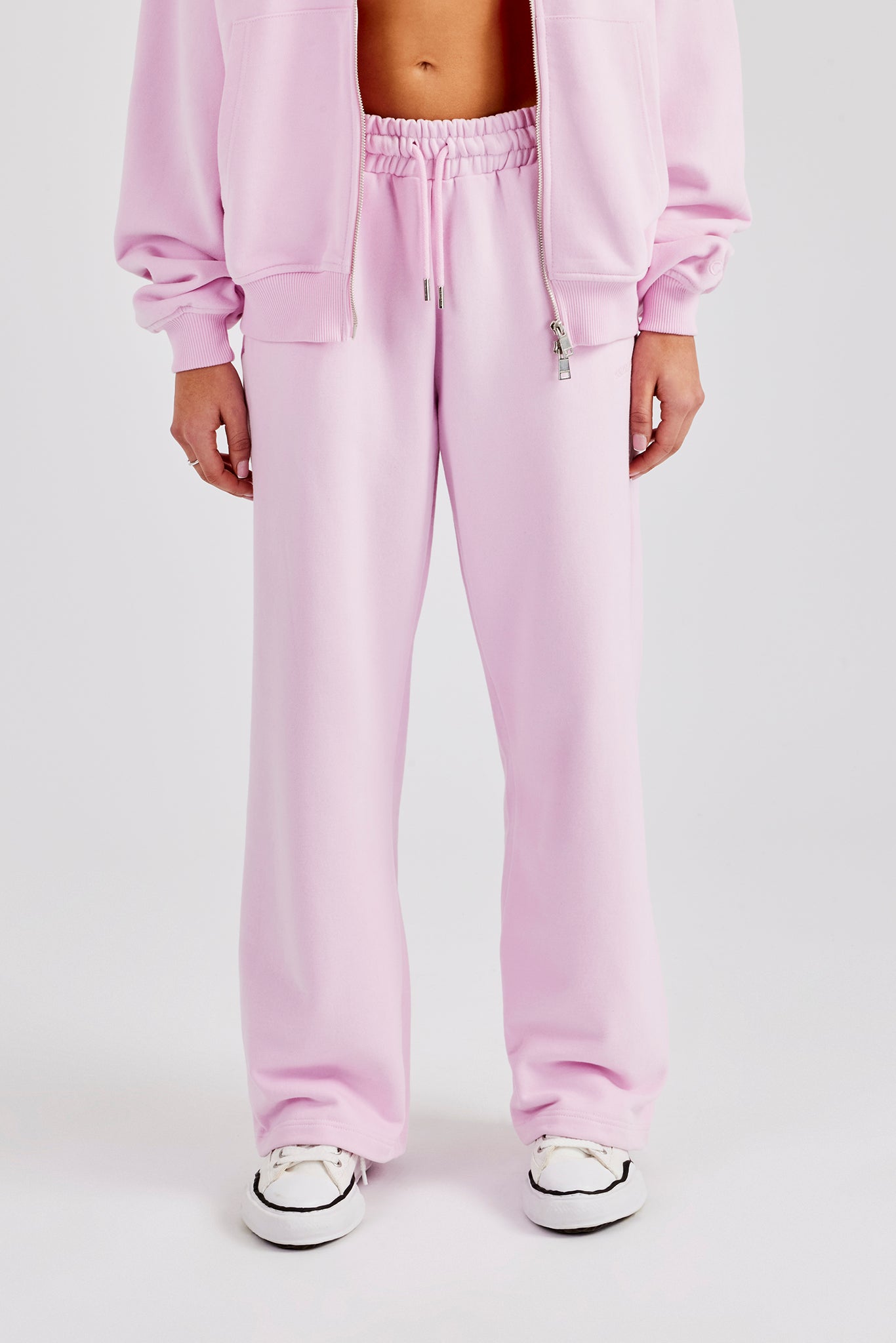 Jogginghose mit weitem Bein und Stickerei - Rosa