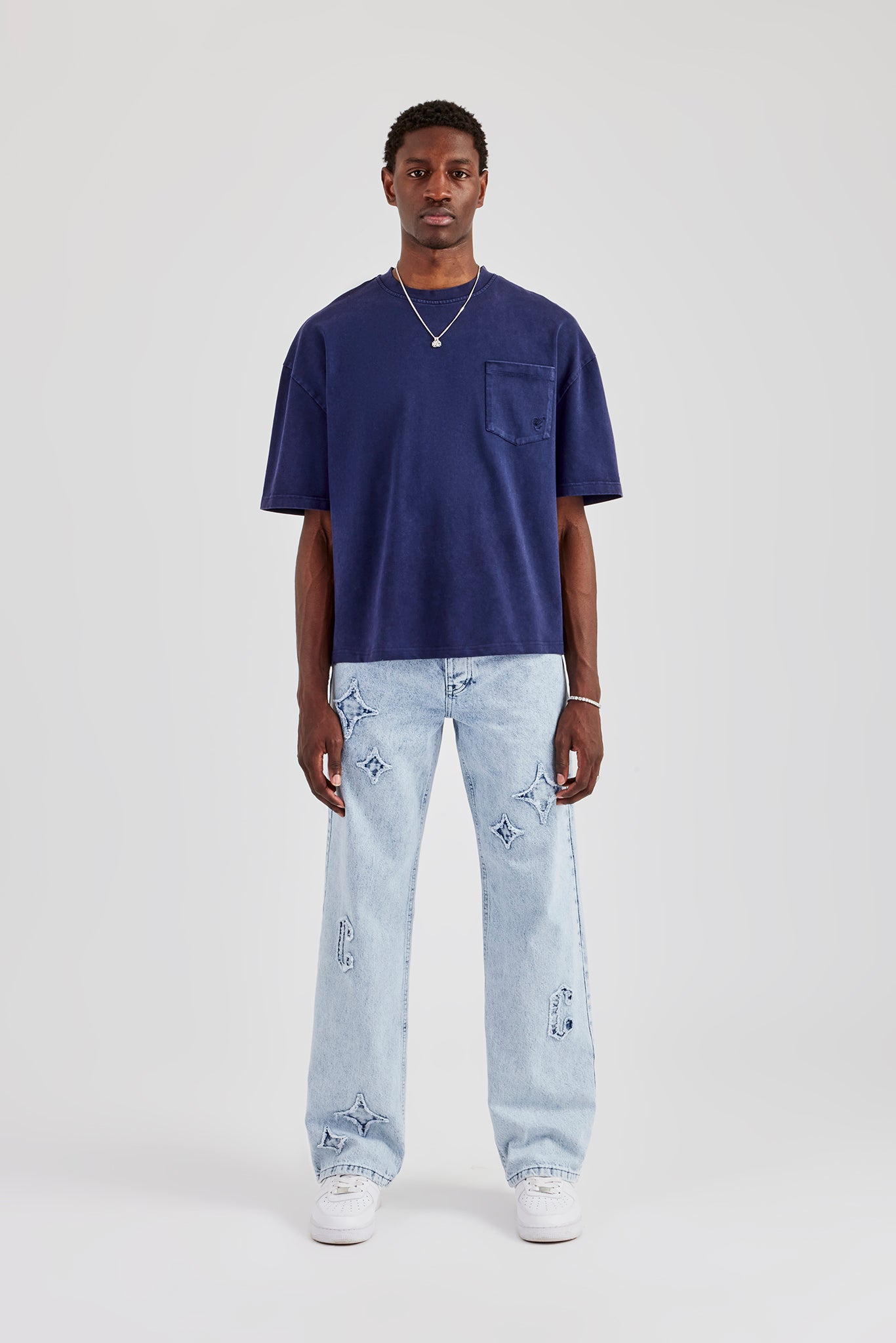 T-Shirt im kastig verwaschenen Stil mit Taschendetail