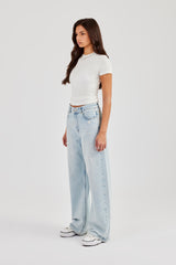 Jeans im Used-Look mit Farbspritzern – Eisblau