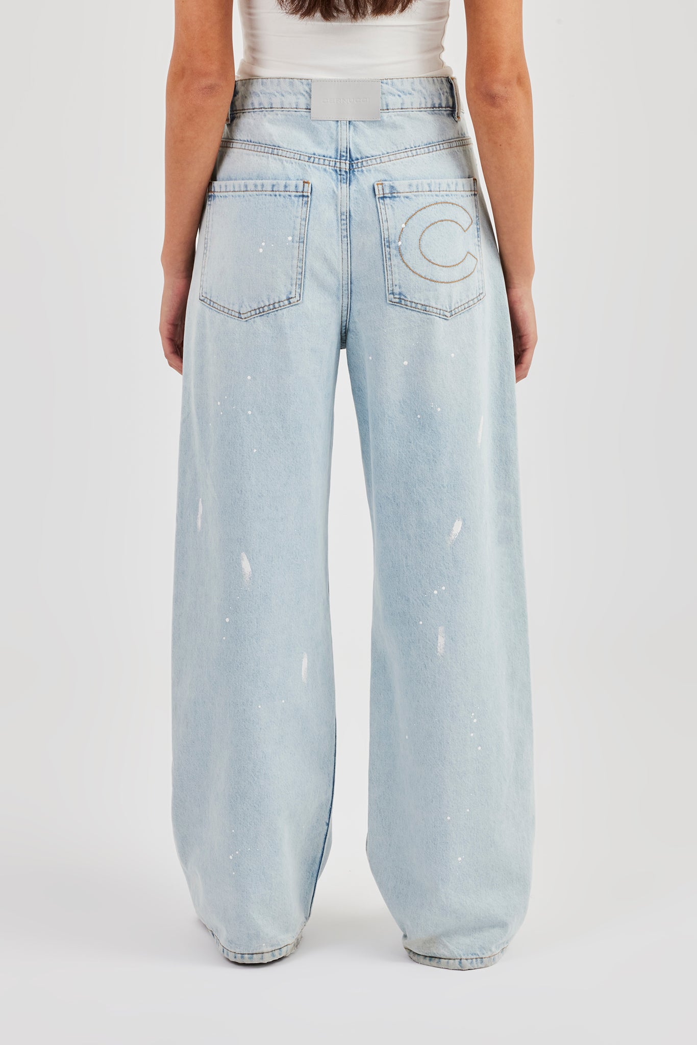 Jeans im Used-Look mit Farbspritzern – Eisblau