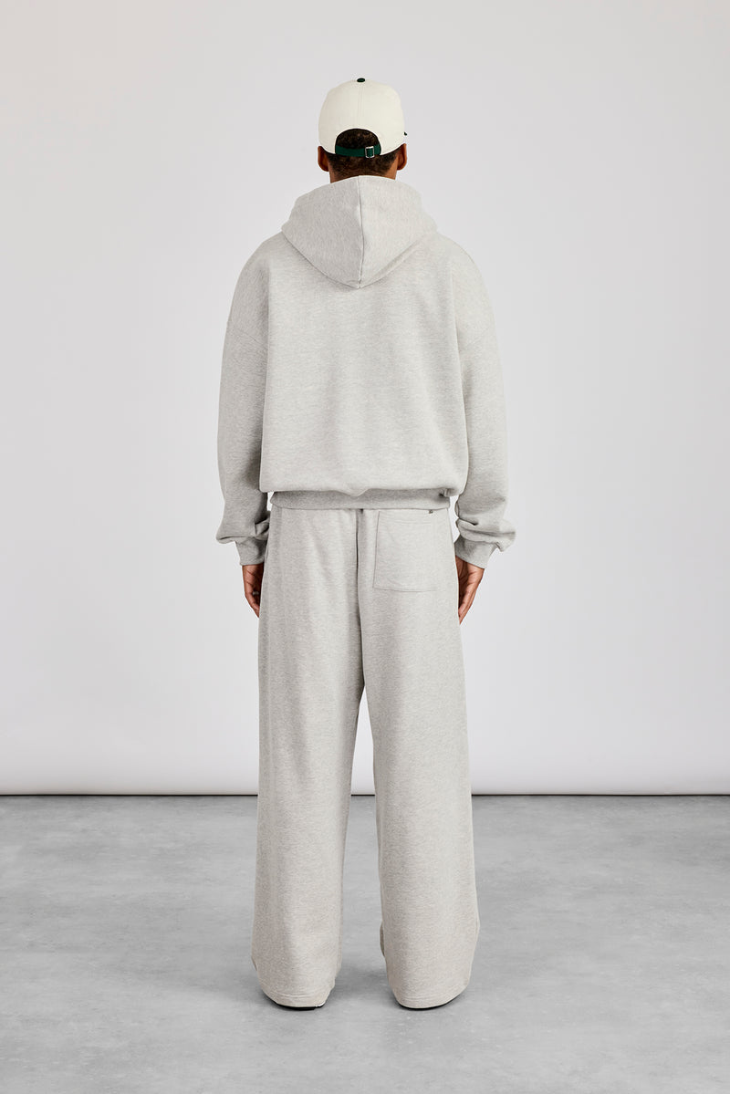 Kapuzenjacke mit Reißverschluss und Jogginghose im Baggy-Fit – Graumeliert