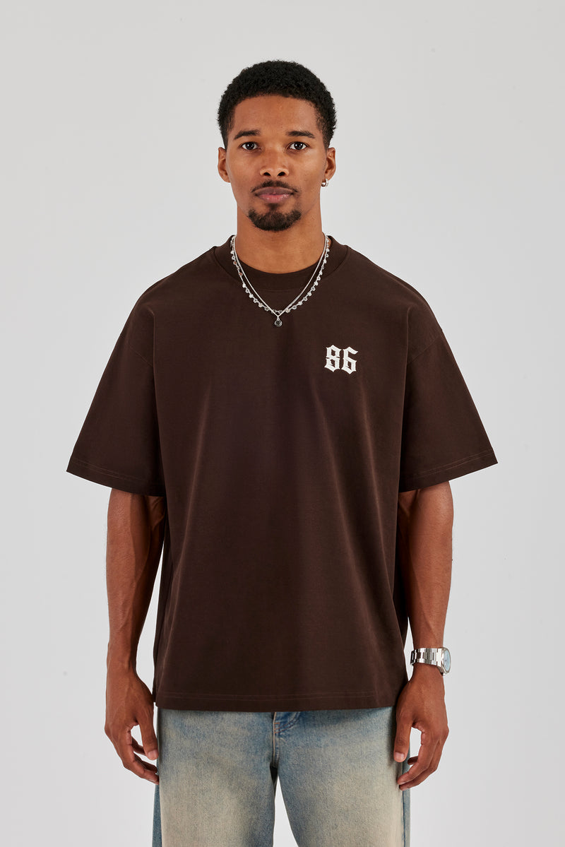 Oversize-T-Shirt mit Cherub-Rückendruck – Schokolade