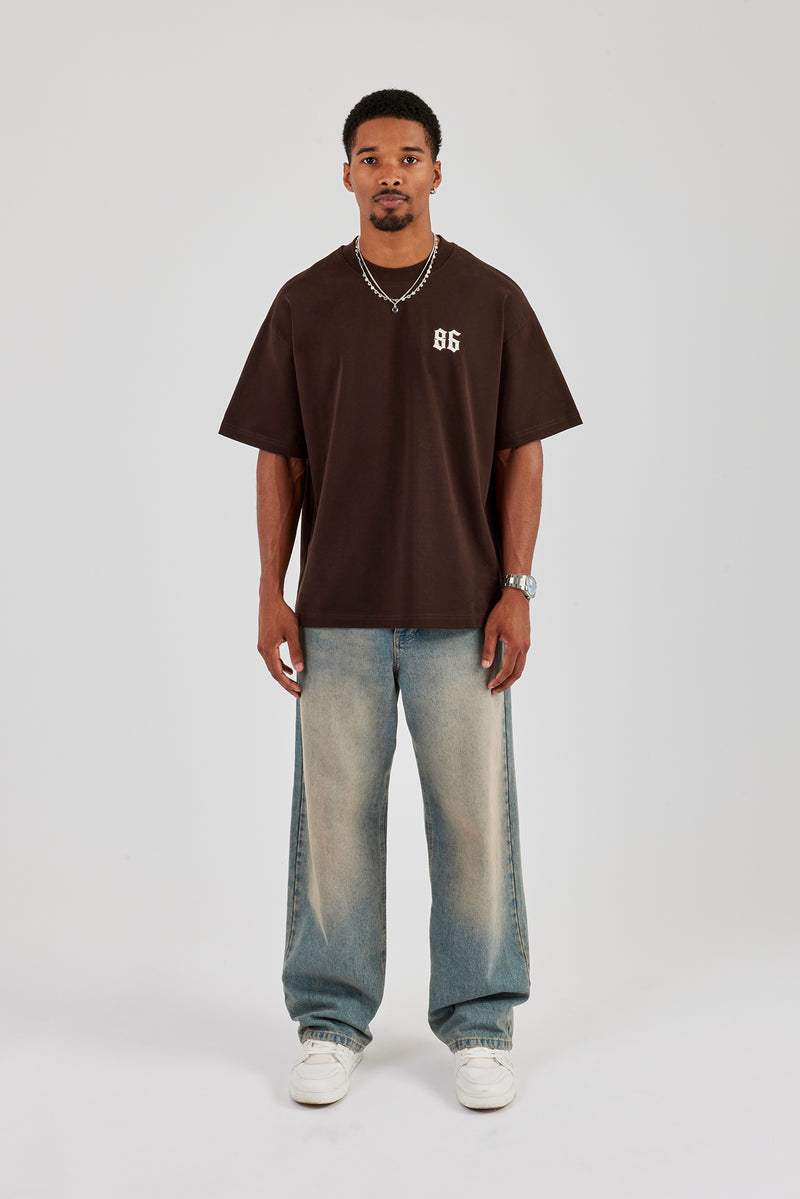 Oversize-T-Shirt mit Cherub-Rückendruck – Schokolade