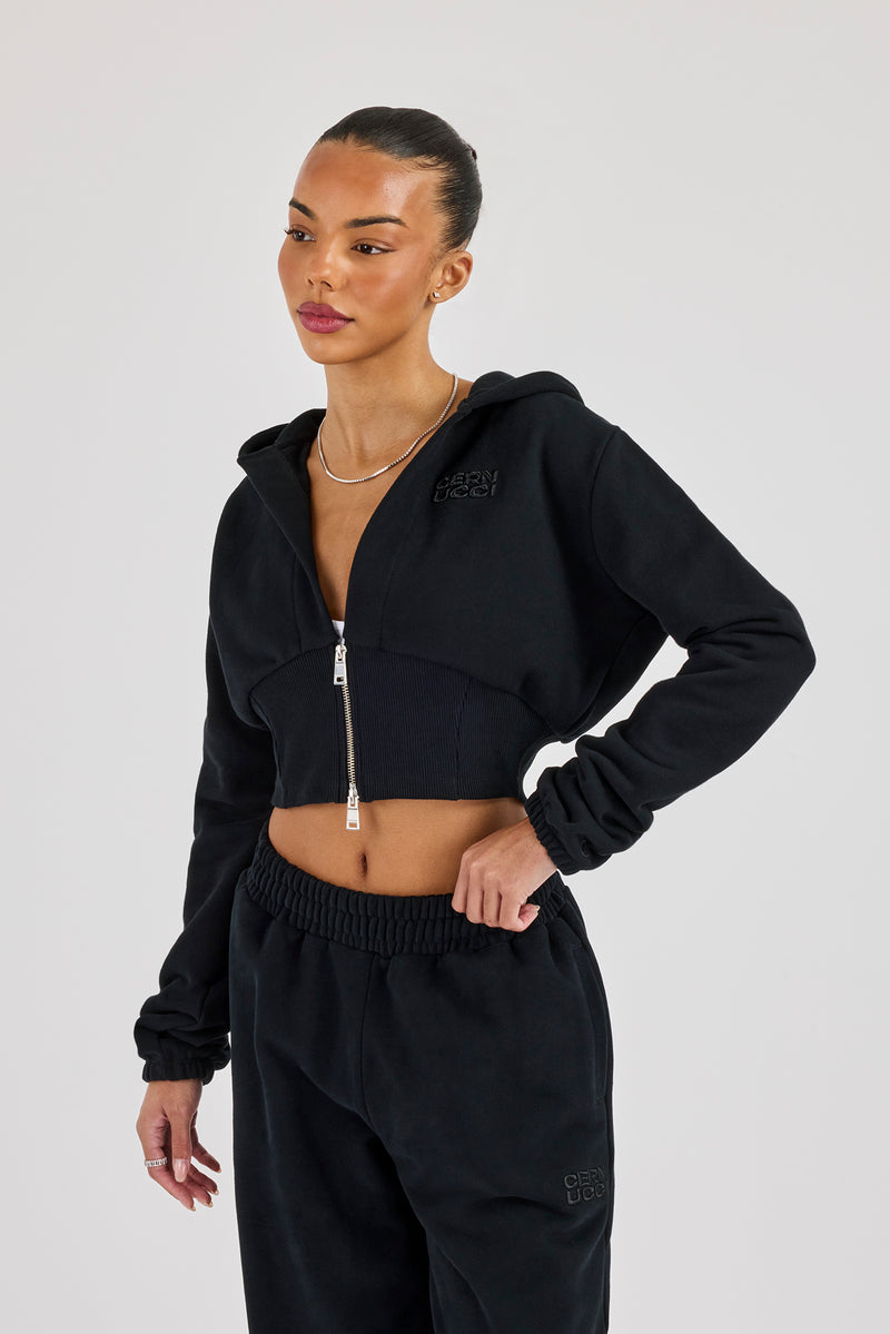 Gerippter Kapuzenpullover mit Kontrastnähten und Reißverschluss – Schwarz