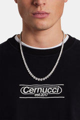 Model wearing the cernucci established embroided sweatshirt in black