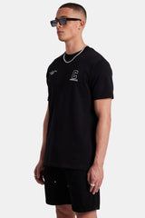 Male model wearing the palm springs text t-shirt in black