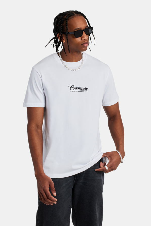 Male model wearing a white t-shirt. tsirt is embroided with logo saying residence club 