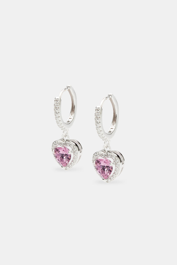 pink heart drop earrings on white background