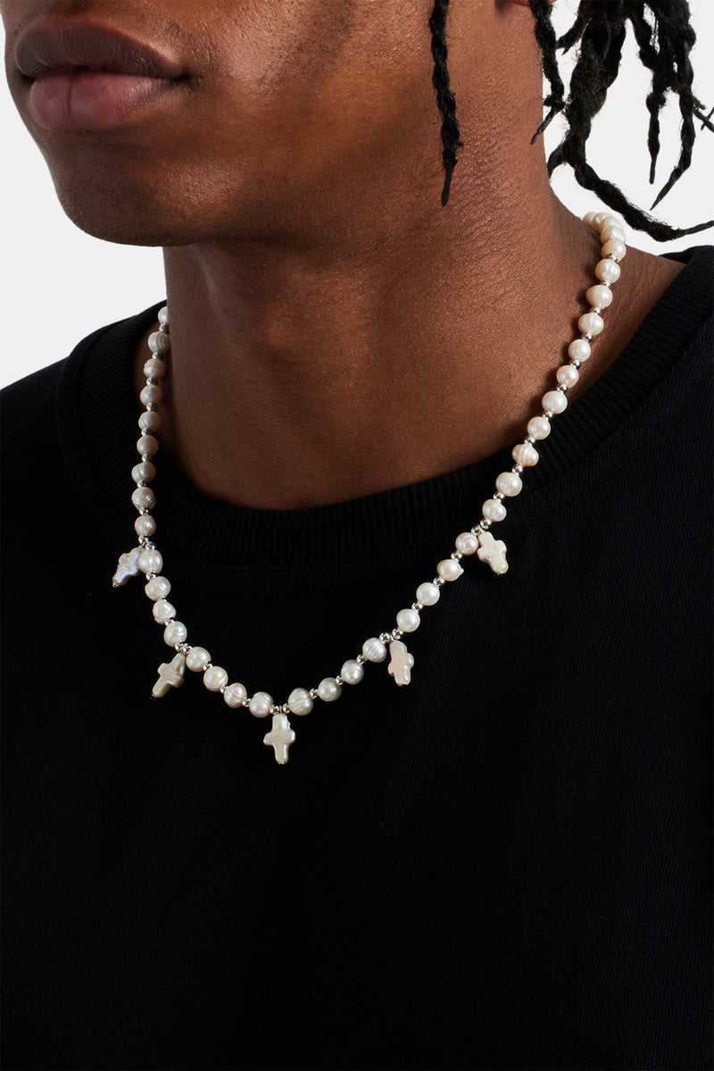 Male model wearing the freshwater pearl cross necklace