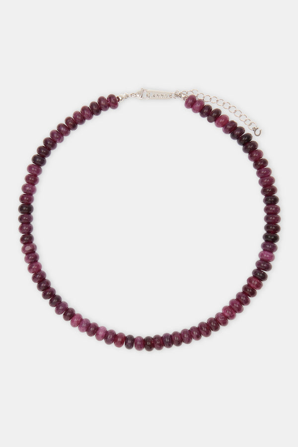 Amethyst bead necklace on white background