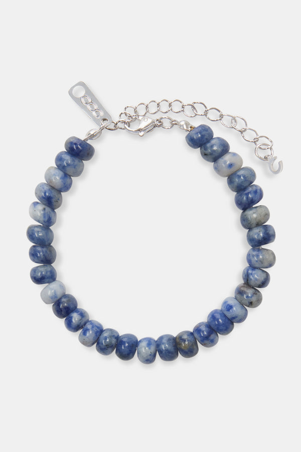 Blue bead bracelet with white background