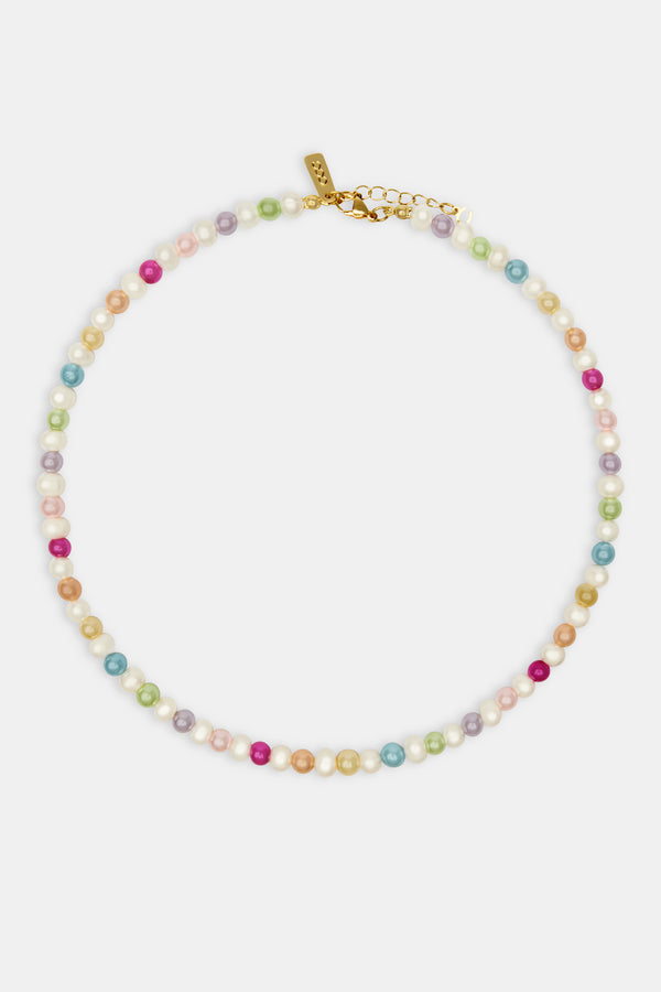 Multicolour pearl necklace on white background