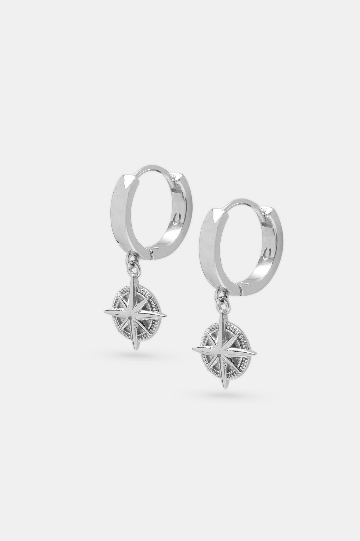 Polierte Kompass-Huggie-Ohrringe