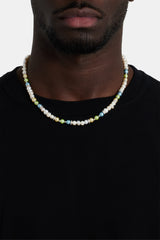 Male model wearing Freshwater pearl bead & ice necklace
