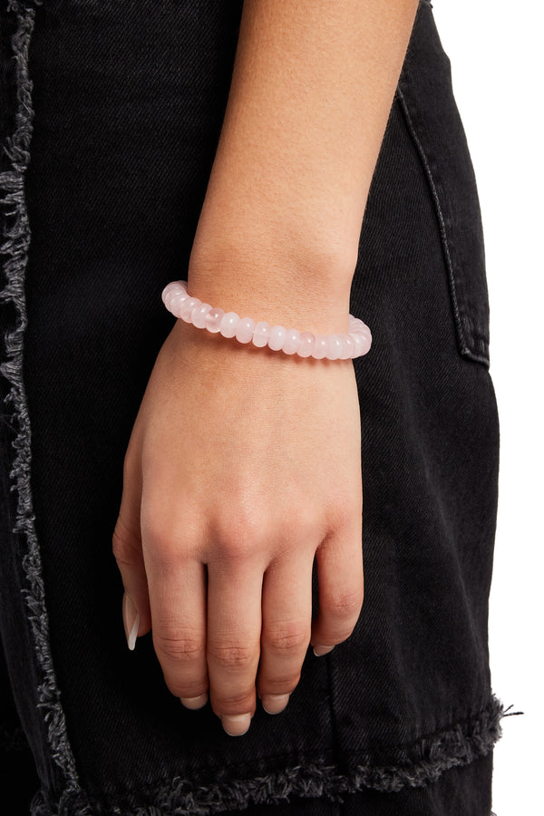 Female model wearing the rose quartz bead bracelet