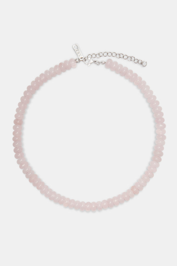 Rose quartz bead necklace in white background 