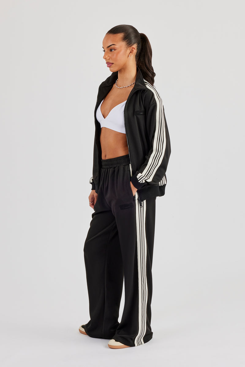 Damen-Trainingshose mit weitem Bein und glattem Polyesterband – Schwarz