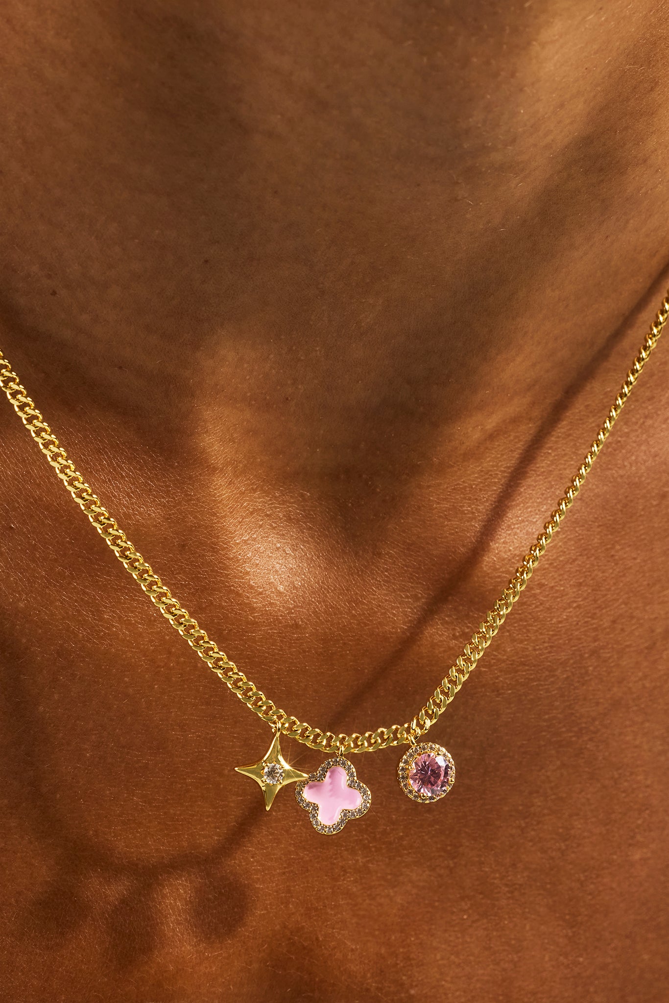 Halskette mit verschiedenen Motiven - 10mm - Gold