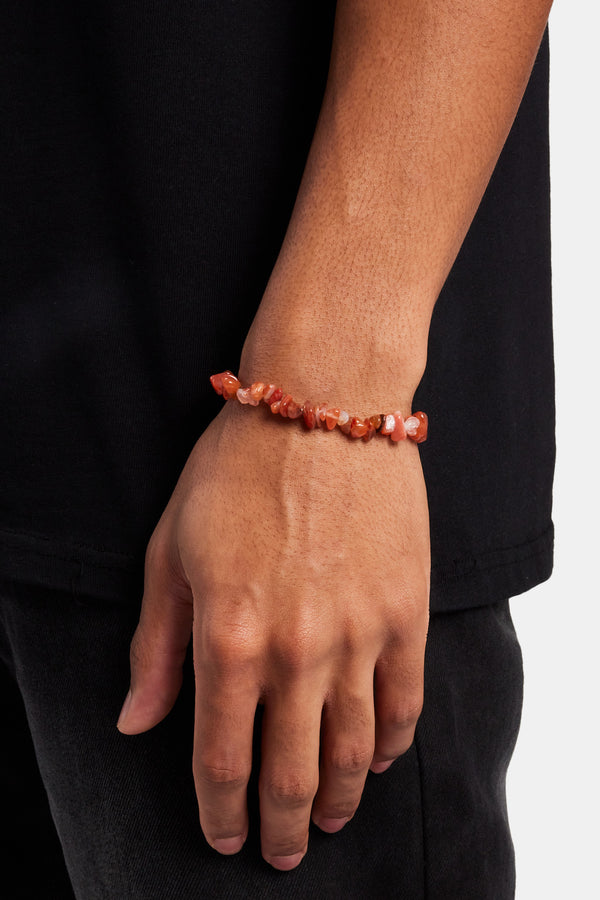 Male model wearing the red agate bead bracelet 